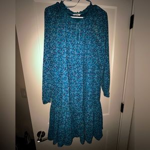 Blue long sleeve floral dress. Dress Size L (12-14). Mesh material.
